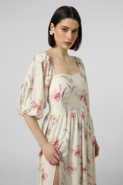 Біла сукня Фрезія з об'ємними рукавами з розрізом 