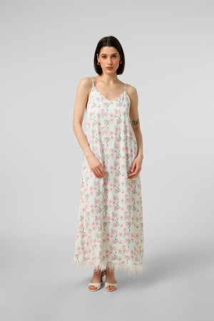 Біла квіткова сукня з оздобленням зі страусиного пір`я